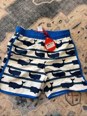 NWT. Hatley kids Navy and White Whale Stripe Swim Shorts, size 7